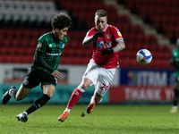 Ronnie Schwartz of Charlton and Haydon Roberts of Rochdale compete for the ball during the Sky Bet League 1 match between Charlton Athletic...