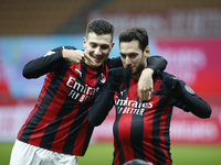 Diego Dalot and Hakan Çalhanoğlu during Tim Cup 2020-2021 match between Milan v Torino, in Milano, on January 12, 2021  (