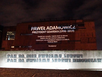 Mayor Adamowicz name displayed on the ECS building facade is seen during the Pawel Adamowicz in memoriam meeting in Gdansk, Poland on 13 Jan...