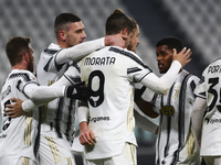 Alvaro Morata of Juventus FC celebrates with teammates after scoring  a goal during the Italy Cup match between Juventus FC and Genoa CFC at...