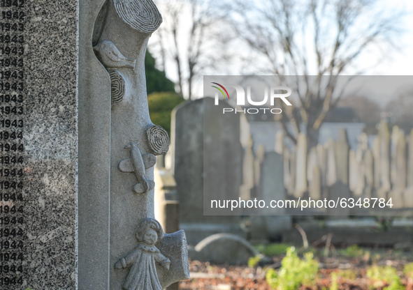 A fragment of the monument commemorating more than 200 children from Bethany Mother and Child Home at Mount Jerome Cemetery in Harold's Cros...
