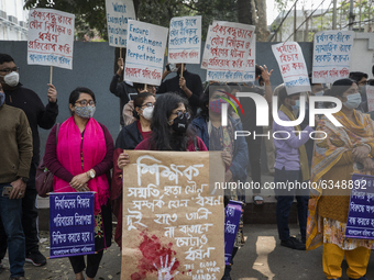 Students from Mastermind School and Bangladesh Mohila Porishad take part in a protest in front of Mastermind school on January 14, 2021,  as...