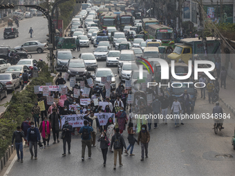 Students from Mastermind School and Bangladesh Mohila Porishad take part in a rally on January 14, 2021,  asking for proper judgment on Aura...