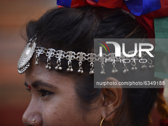 A Portrait of Nepalese Tharu community girl in a traditional attire during Maghi festival or the New Year at Kathmandu, Nepal on Thursday, J...