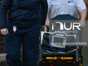 Paramedics with an ambulance stretcher seen outside the Mater Private Hospital in Dublin, during Ireland's third national lockdown. 
The Dep...
