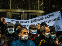 Members of labour unions take part in a protest against the government on January 15, 2021 in Ankara, Turkey. Labour unions demand a decent...