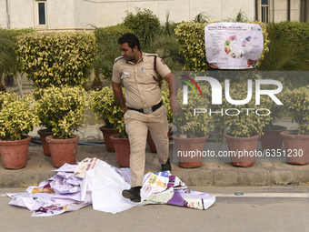 Police personnel postering outside a COVID-19 vaccination centre in Delhi on 15 January 2021. COVID-19 vaccination to be conducted at 81 cen...