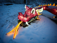 The legend of the Wawel Dragon is presented among scenes from 'Krakow Legends Park', the open-air light exhibition  located in Nowa Rezydenc...
