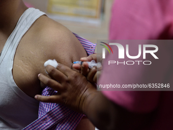 Health workers awaits for the Coronavirus vaccination in Kolkata, India, on January 16, 2021 (