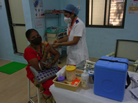 Medical staff members perform a vaccination drive against COVID-19 in Mumbai, India on January 16, 2021. (