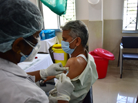 Nagpur, India. 16, Jan 2021. A medical worker receives an injection of the COVISHIELD Covid-19 vaccine at the Indira Gandhi Government Medic...