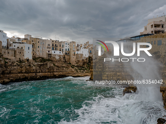 Strong wind and high waves hit the Lama Monachile cliff in Polignano a Mare on January 16, 2021.
The arrival of the 