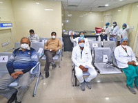 Health workers at observation room after receiving the first dose of Covaxin vaccine , at Haribakash Kanwatia Hospital in Jaipur,Rajasthan,...