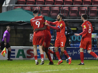 Tunji Akinola,Conor Wilkinson,Jobi McAnuff of Leyton Orient celebrate a goal during the Sky Bet League Two match between Leyton Orient and M...