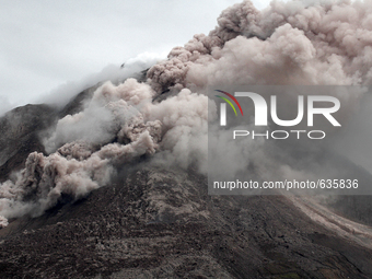 Sinabung volcano spews ash and spitting out volcanic material after following the increase in the alert level to the highest level of the vo...