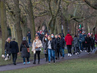  People enjoy a Sunday walk in Wandsworth Common as England remains under lockdown to limit the spread of the new, more transmissible, strai...