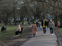  People enjoy a Sunday walk in Wandsworth Common as England remains under lockdown to limit the spread of the new, more transmissible, strai...
