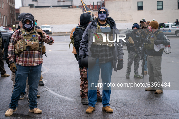 Ohio Boogaloo Bois prepare to march during an armed protest at the Ohio Statehouse ahead of the inauguration of President-elect Joe Biden in...