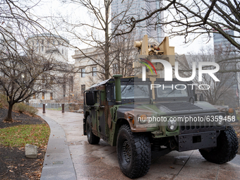 An Ohio National Guard vehicle blocks an entry point during an armed protest at the Ohio Statehouse ahead of the inauguration of President-e...