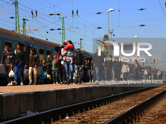 Migrants arrive by train to Hegyeshalom train station close to the Hungarian-Austrian border. Hegyeshalom, Hungary on 28 September 2015. A r...