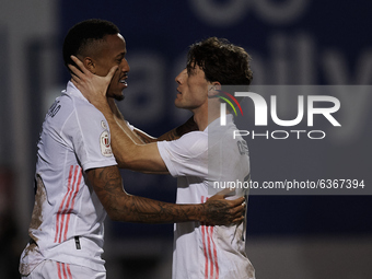 Eder Militao of Real Madrid celebrates with Alvaro Odriozola after scoring his sides first goal during the round of 32 the Copa del Rey matc...