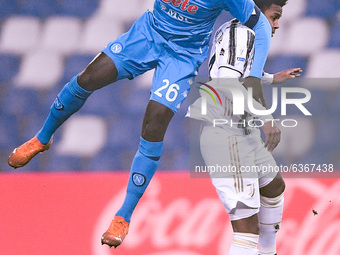 Kalidou Koulibaly of SSC Napoli and Weston McKennie of Juventus FC jump for the ball during the Italian PS5 Supercup Final match between FC...