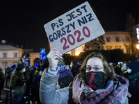 People take part in a demonstration against the abortion ban law, in Warsaw, Poland, on January 20, 2021. (