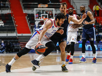 Vasilije Micic (L) of Anadolu Efes and Kevin Pangos of Zenit St Petersburg in action during the EuroLeague Basketball match between Zenit St...