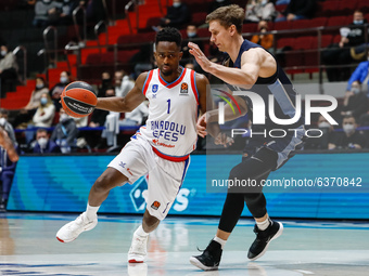 Anton Pushkov (R) of Zenit St Petersburg and Rodrigue Beaubois of Anadolu Efes in action during the EuroLeague Basketball match between Zeni...