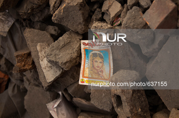 A wrapper for a hair care product lies amongst the ruins of Bhaktapur, South of Kathmandu, Nepal. One month after Nepal's devastating earthq...