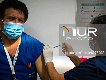 An health worker receive the Sputnik V vaccine in Buenos Aires, Argentina, on January 22, 2021. (