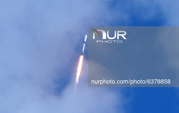 A SpaceX Falcon 9 rocket launches from pad 40 at Cape Canaveral Space Force Station on January 24, 2021 in Cape Canaveral, Florida. The Tran...