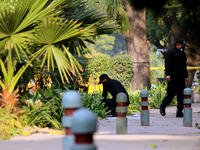 A team of National Security Guard (NSG) visits the site of an explosion near the Israeli embassy to examine the nature of the explosives use...