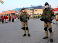 Delhi Police personnel stand guard near the New Delhi Railway Station in New Delhi, India on January 30, 2021. A low-intensity blast was rep...