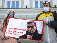 People gathered to support Russian opposition politician Alexei Navalny and demand for his release from prison in Moscow. Krakow, Poland on...
