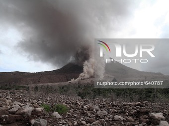 An image available on June 14, 2015, which shows the Sinabung volcano blobs emit a pyroclastic flow into the air after the latest eruption f...