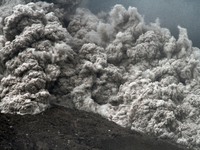 Mount Sinabung spews ash pyroclastic slid as seen from the village of Tiga Serangkai, in Karo, North Sumatra, Indonesia, June 16, 2015. Indo...