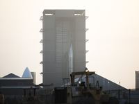 SpaceX Starship SN11 being built in the High Bay behind SN10 at sunset on Monday,  February 8, 2021.  - Starship SN10 performed succesful am...