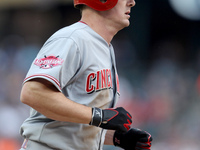 Cincinnati Reds' Jay Bruce round the bases after his solo home run in the fifth inning of a baseball game against the Detroit Tigers in Detr...