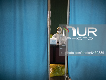  Vaccinator waiting for the vaccine to arrive. 2nd Phase of Vaccination covid19 for health worker in Indonesia held at one of location at He...