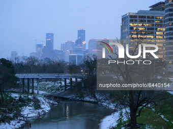 The Houston skyline seen from Buffalo Bayou Park early on the morning of Monday, February 15th after the snow storm.  (