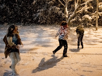 People are playing with the snow in Athens, Greece, on February 15, 2021. The snowfall called 'Medea' showed up in the area of Zografou in A...
