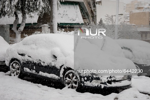A snow covered car in the area of Zografou in Athens, Greece on February 16, 2021. The snowfall called 'Medea' showed up in Greece. 