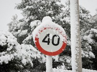 A snow covered road sign in the area of Zografou in Athens, Greece on February 16, 2021. The snowfall called 'Medea' showed up in Greece. (