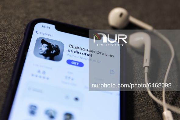 Clubhouse Drop-in audio chat app logo on the App Store is seen displayed on a phone screen in this illustration photo taken in Poland on Feb...