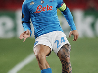 Lorenzo Insigne of Napoli does passed during the UEFA Europa League Round of 32 match between Granada CF and SSC Napoli at Estadio Nuevo los...