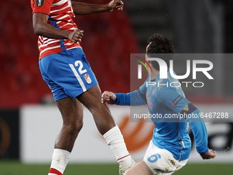 Dimitri Foulquier of Granada  in action during the UEFA Europa League Round of 32 match between Granada CF and SSC Napoli at Estadio Nuevo l...