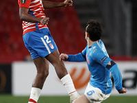 Dimitri Foulquier of Granada  in action during the UEFA Europa League Round of 32 match between Granada CF and SSC Napoli at Estadio Nuevo l...