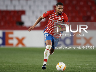 Yangel Herrera of Granada runs with the ball during the UEFA Europa League Round of 32 match between Granada CF and SSC Napoli at Estadio Nu...