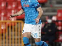 Amir Rrahmani of Napoli in action during the UEFA Europa League Round of 32 match between Granada CF and SSC Napoli at Estadio Nuevo los Car...